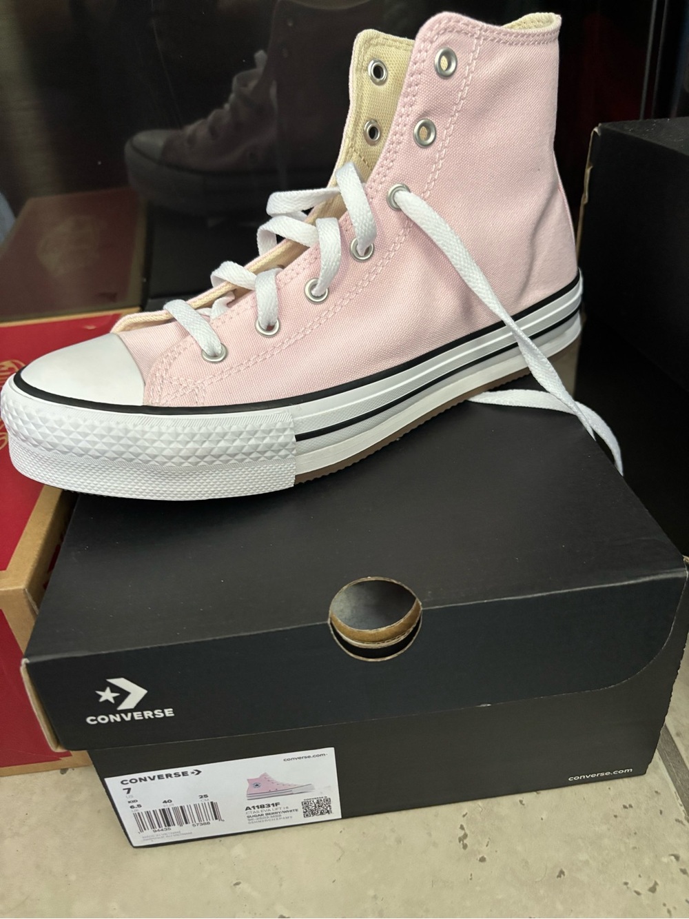 Converse Pink High-Top Canvas Sneaker with White Sole